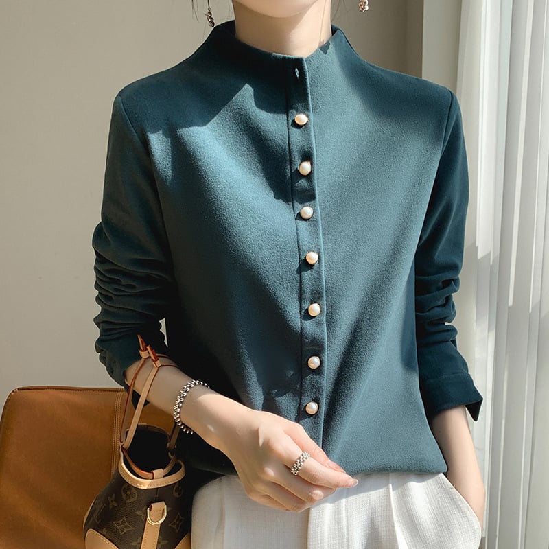 Kreklis kardigāns no ķīmisko šķiedru maisījuma ar poliesteru, vienkrāsains, stāvošā apkakle, garas piedurknes, pūderēta virsma, pērlīšu pogas, izsmalcināts ikdienas stils, garums 50–65 cm