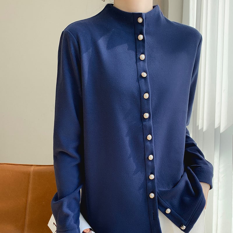 Kreklis kardigāns no ķīmisko šķiedru maisījuma ar poliesteru, vienkrāsains, stāvošā apkakle, garas piedurknes, pūderēta virsma, pērlīšu pogas, izsmalcināts ikdienas stils, garums 50–65 cm