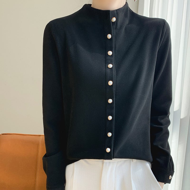 Kreklis kardigāns no ķīmisko šķiedru maisījuma ar poliesteru, vienkrāsains, stāvošā apkakle, garas piedurknes, pūderēta virsma, pērlīšu pogas, izsmalcināts ikdienas stils, garums 50–65 cm