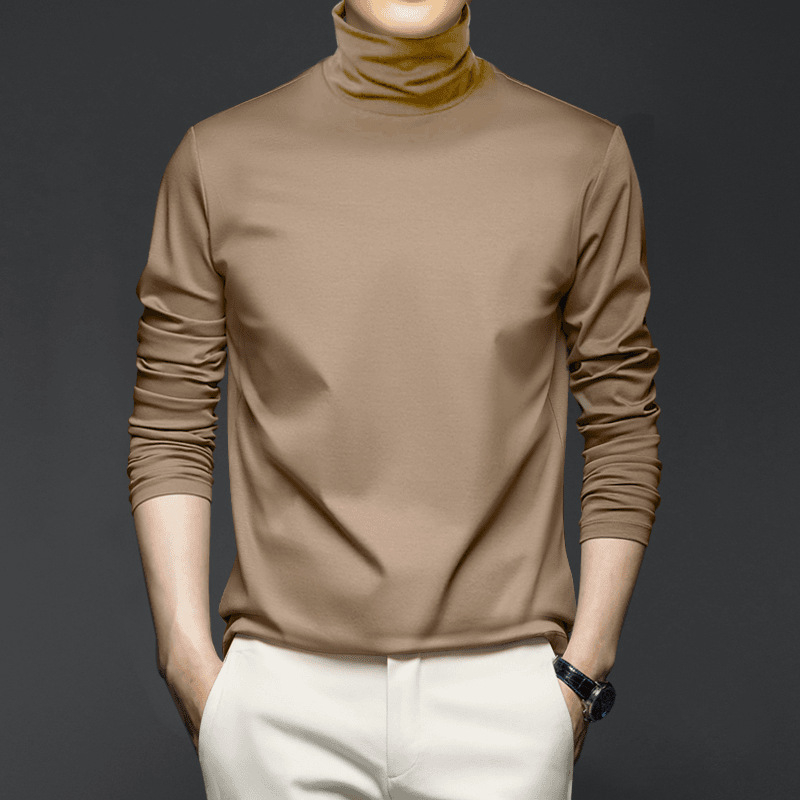 Tricou din bumbac mercerizat cu mâneci lungi, guler înalt, croială lejeră; compoziție 86.9% bumbac, 10.9% poliester, 2.2% elastan; greutate 180–250 g