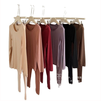 Set termic de bază pentru femei — tricou cu guler rotund fără cusături și pantaloni, nailon 82% / spandex 18%, țesătură ultraușoară (61–80 g/m2)