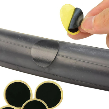 Kalnu velosipēdu riepu remonta komplekts bez līmes — plāksteri un instrumenti plastmasas kastē