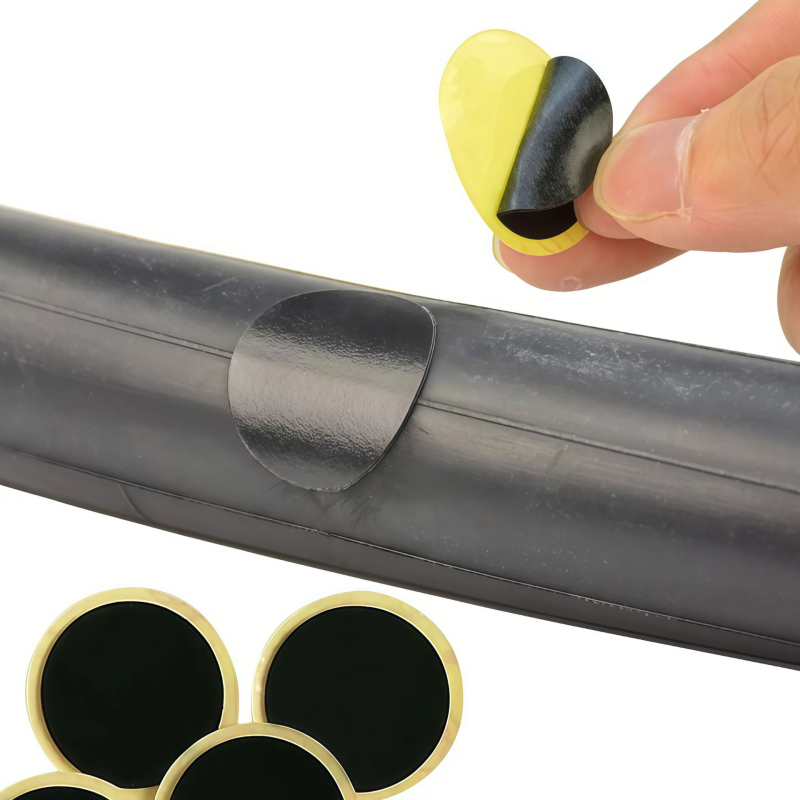 Kalnu velosipēdu riepu remonta komplekts bez līmes — plāksteri un instrumenti plastmasas kastē