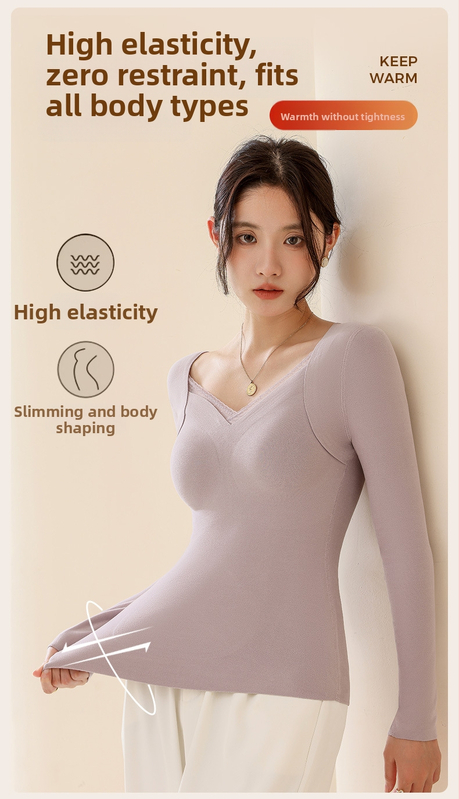 Moteriškas vilnos-silkės šiluminis viršus su V kaklu, įsiūtos krūties kaušės, tankus mezginys 251–300 g/m², pagrindinis audinys 80–90%, ilgos rankovės, kūno formavimas