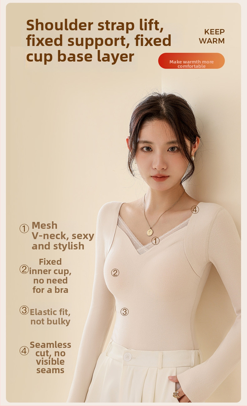 Moteriškas vilnos-silkės šiluminis viršus su V kaklu, įsiūtos krūties kaušės, tankus mezginys 251–300 g/m², pagrindinis audinys 80–90%, ilgos rankovės, kūno formavimas