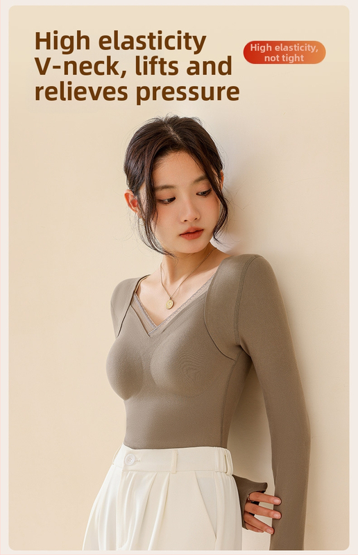 Moteriškas vilnos-silkės šiluminis viršus su V kaklu, įsiūtos krūties kaušės, tankus mezginys 251–300 g/m², pagrindinis audinys 80–90%, ilgos rankovės, kūno formavimas