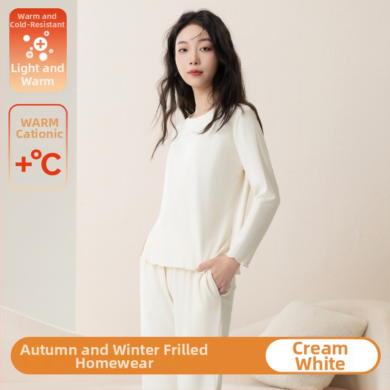 Sieviešu pidžāmas komplekts rudens–ziemas sezonai ar fleece oderi, bieza auduma, apaļš kakls, garas piedurknes; var valkāt ārpus mājas.