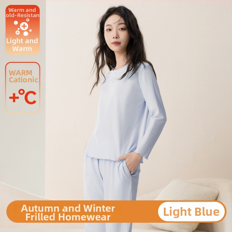 Sieviešu pidžāmas komplekts rudens–ziemas sezonai ar fleece oderi, bieza auduma, apaļš kakls, garas piedurknes; var valkāt ārpus mājas.