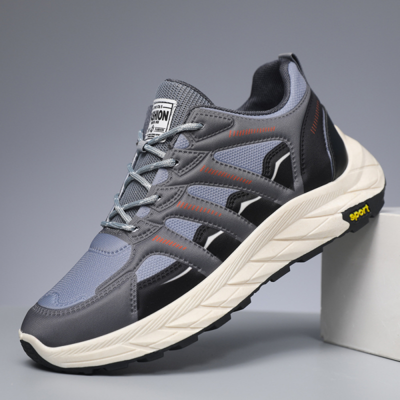 Muške sportske casual tenisice s gornjim PU+mrežastim dijelom, prozračne; vezanje šavom; đon od plastike injekcijskim oblikovanjem; visina potpetice 3–5 cm