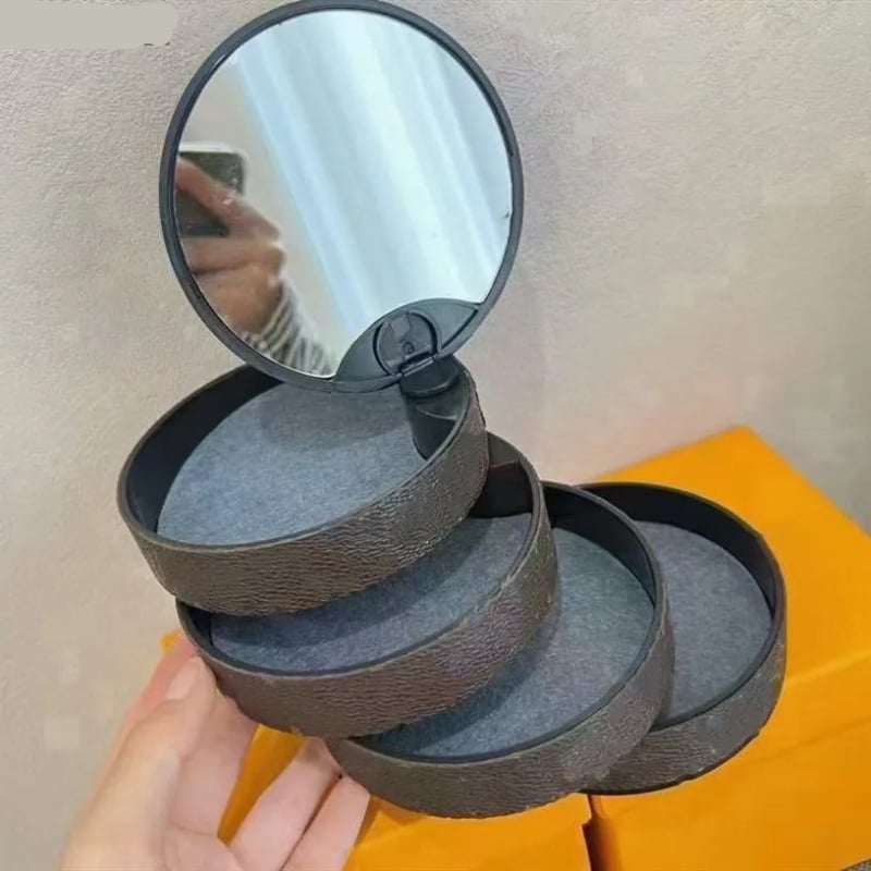 Τέσσερα επίπεδα περιστρεφόμενο κουτί κοσμημάτων με καθρέφτη για αλυσίδες και βραχιόλια (ABS υλικό, σκληρότητα: σκληρό, στυλ ελαφρού πολυτελείας)