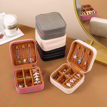 Ādas rotaslietu kastīte Eiropas stilā, pārnēsājama, daudzfunkcionāla uzglabāšanai gredieniem, auskarām un rokassprādzēm; materiāli: flanelis, sūklis, plastmasa, mehāniskie piederumi; svars: 200 g