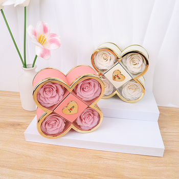 Kaklarotas dāvanu kastīte ar slēgtu četru lapu rozes mehānismu, plastmasas korpuss, kartona iepakojums, iekļauj dāvanu kastīti ar ziediem un somu