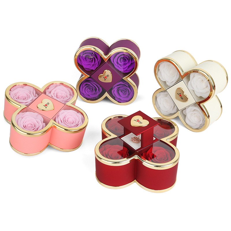 Kaklarotas dāvanu kastīte ar slēgtu četru lapu rozes mehānismu, plastmasas korpuss, kartona iepakojums, iekļauj dāvanu kastīti ar ziediem un somu
