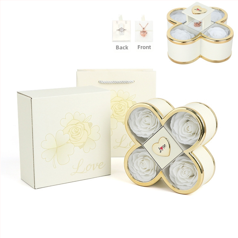 Kaklarotas dāvanu kastīte ar slēgtu četru lapu rozes mehānismu, plastmasas korpuss, kartona iepakojums, iekļauj dāvanu kastīti ar ziediem un somu