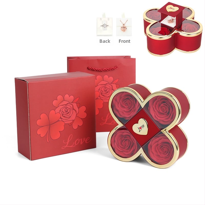 Kaklarotas dāvanu kastīte ar slēgtu četru lapu rozes mehānismu, plastmasas korpuss, kartona iepakojums, iekļauj dāvanu kastīti ar ziediem un somu