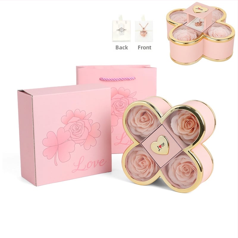 Kaklarotas dāvanu kastīte ar slēgtu četru lapu rozes mehānismu, plastmasas korpuss, kartona iepakojums, iekļauj dāvanu kastīti ar ziediem un somu