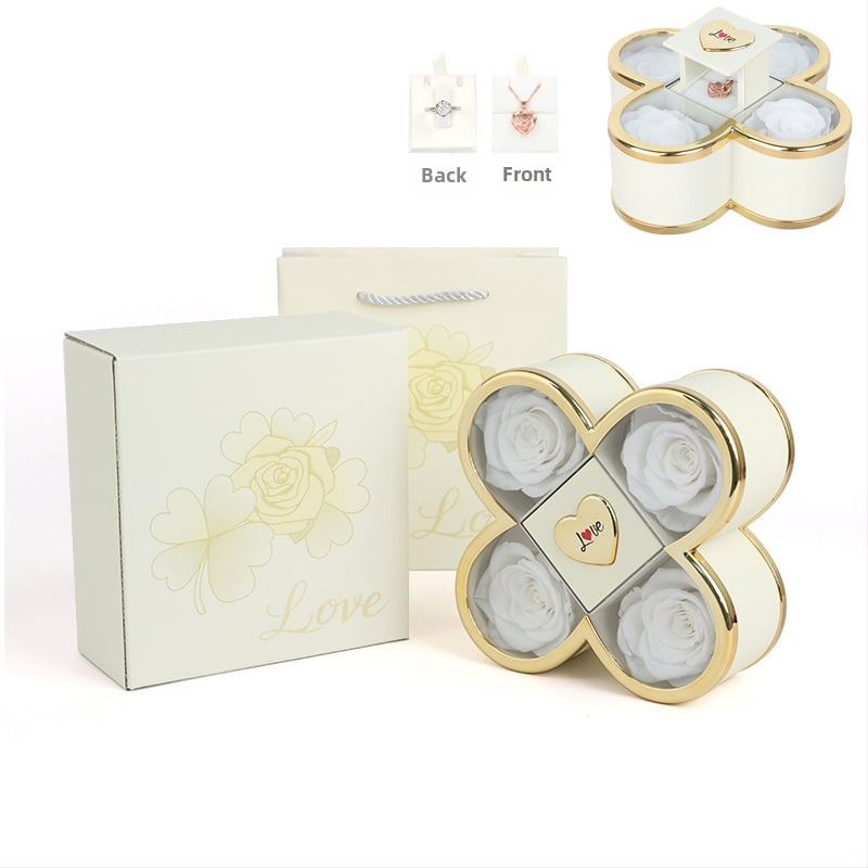 Kaklarotas dāvanu kastīte ar slēgtu četru lapu rozes mehānismu, plastmasas korpuss, kartona iepakojums, iekļauj dāvanu kastīti ar ziediem un somu