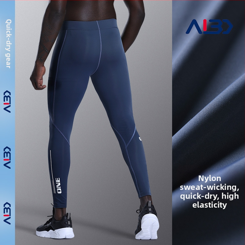 Férfi kompressziós leggings edzéshez és futáshoz; magas elasztikusság, gyorsan száradó anyag; hosszú leggings; 77% nylon; ideális edzéshez, kosárlabdázáshoz és jóga.