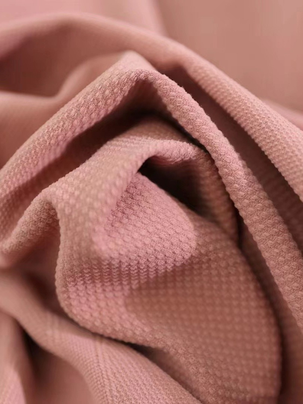 Varrásmentes, hosszú ujjú női jóga felső – csípőig érő hossz, testhez álló szabás, nylon anyag, elasztikusság