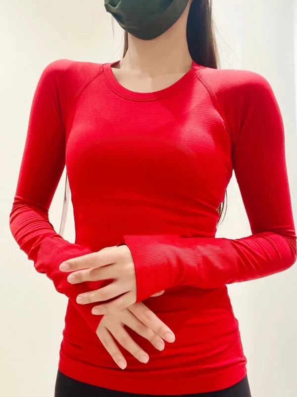 Varrásmentes, hosszú ujjú női jóga felső – csípőig érő hossz, testhez álló szabás, nylon anyag, elasztikusság