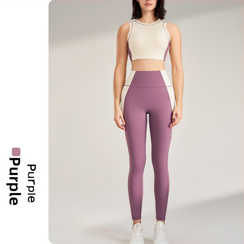 Välistingimustes spordikomplekt: kiiresti kuivatuv ülaosa ilma varrukateta ümmarguse kaelusega ja sisemine tank, devyni punkti pikkusega püksid, Lycra/Nailon kangas (75% Nylon), naistele