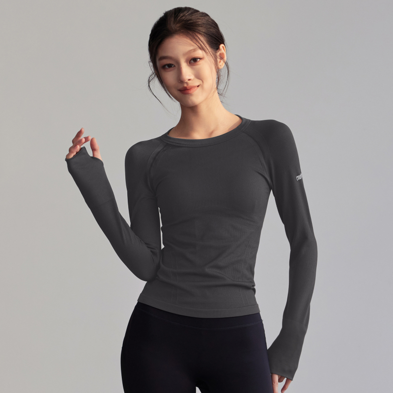 Női pilates és jóga hosszú ujjú felső - karcsú szabás, derékig érő hossz, egyszínű mintázat, anyag 80% nylon, bélés spandexszel, futásra és edzéshez