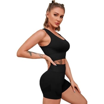 Дамски безръкав спортен комплект от две части: пуловер бюст топ с презрамки, панталони с дължина три четвърти, нейлон-спандекс материал, подплънки за бюста включени