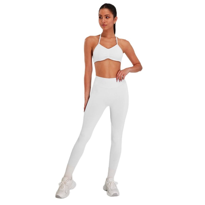 Йога комплект: халтерно горнище с открит гръб, висока талия, безшевни панталони от найлон/спандекс и подплатен спортен сутиен