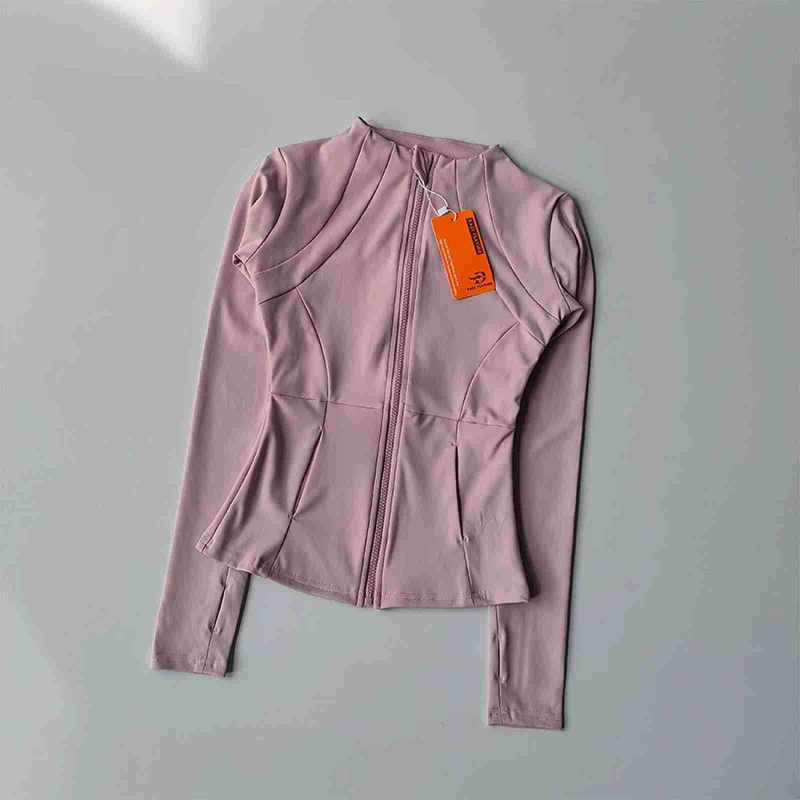 Női jóga felső álló gallérral, hosszú ujjú, szűk fazonú, gyorsan száradó anyag, poliészter–spandex keverék (82,5% poliészter, 17,5% spandex), hasig érő hossz