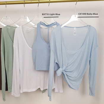 Naiste hingav pikkade varrukatega jooga-top, laia lõikega ja U-kaelusega, veidi läbipaistev, nailonist väline kangas, vooder 80% polüester / 20% viskoos.