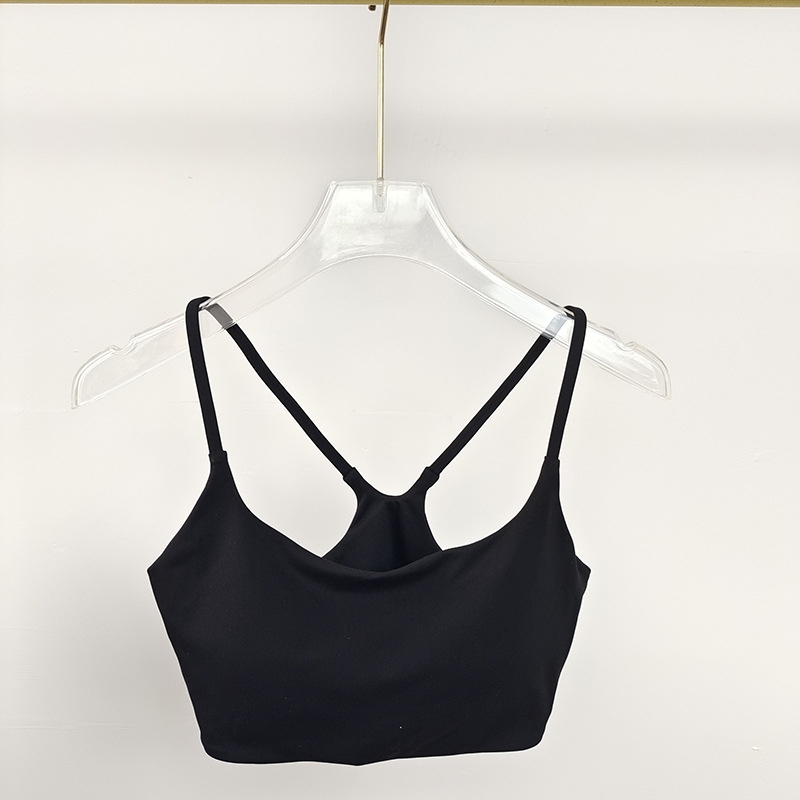 Naiste hingav pikkade varrukatega jooga-top, laia lõikega ja U-kaelusega, veidi läbipaistev, nailonist väline kangas, vooder 80% polüester / 20% viskoos.