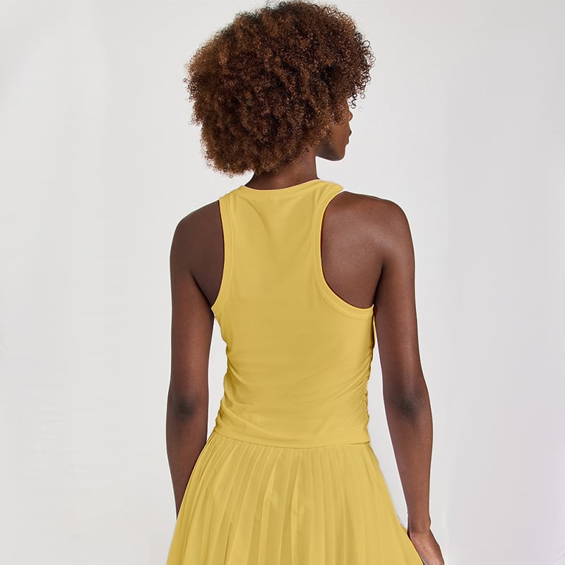 Naistele spordikomplekt: vest ja plisseeritud seelik, hingav, keemiliste kiudude segu (Nylon 88% / vooder Spandex 12%), kevad-suvi