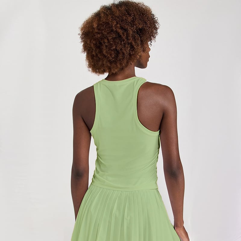 Naistele spordikomplekt: vest ja plisseeritud seelik, hingav, keemiliste kiudude segu (Nylon 88% / vooder Spandex 12%), kevad-suvi