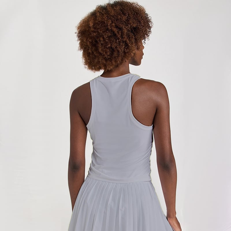 Naistele spordikomplekt: vest ja plisseeritud seelik, hingav, keemiliste kiudude segu (Nylon 88% / vooder Spandex 12%), kevad-suvi