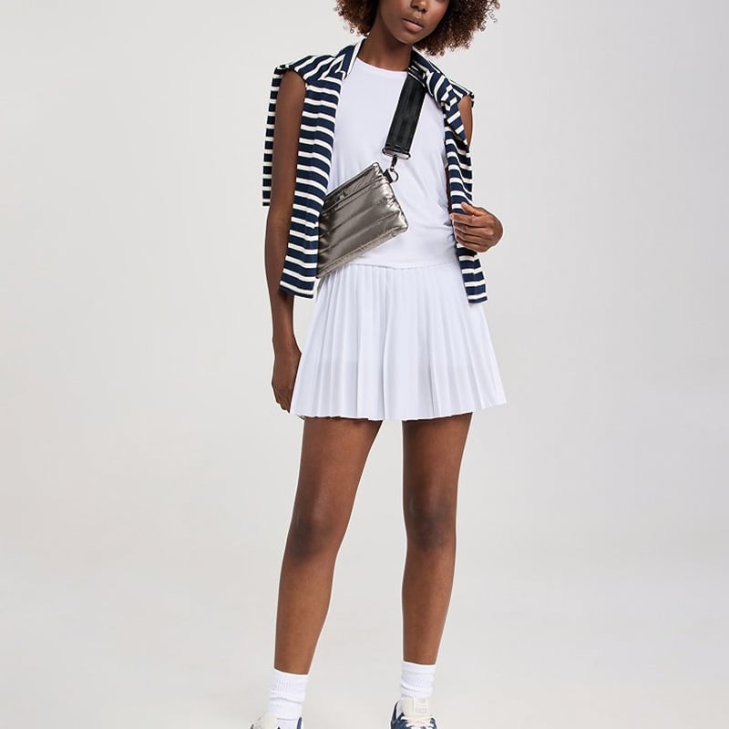 Naistele spordikomplekt: vest ja plisseeritud seelik, hingav, keemiliste kiudude segu (Nylon 88% / vooder Spandex 12%), kevad-suvi