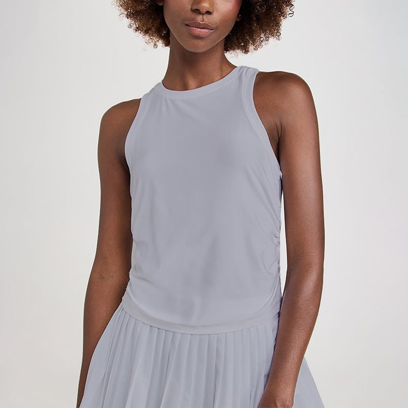 Naistele spordikomplekt: vest ja plisseeritud seelik, hingav, keemiliste kiudude segu (Nylon 88% / vooder Spandex 12%), kevad-suvi