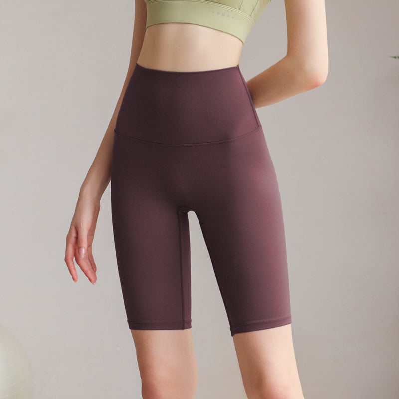 Női magas derekú jóga nadrág meztelen érzetű anyaggal, ötpont hosszúságú, nylon-spandex 80/20, nedvszívó és gyorsan száradó, haskontroll, nagy rugalmasság