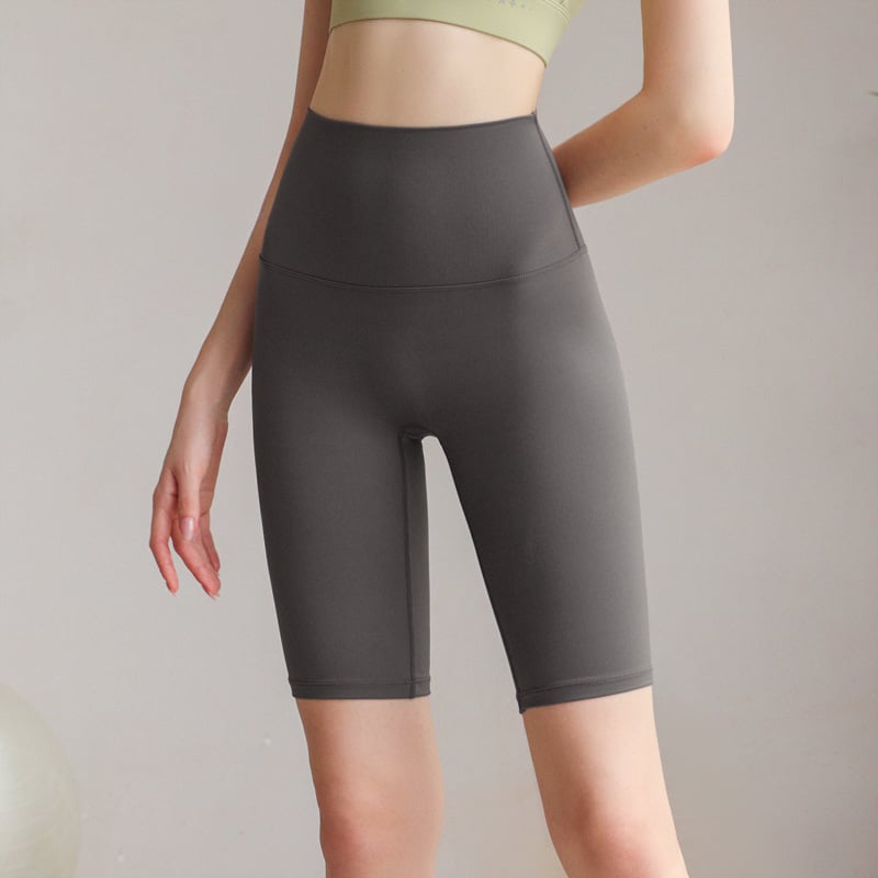 Női magas derekú jóga nadrág meztelen érzetű anyaggal, ötpont hosszúságú, nylon-spandex 80/20, nedvszívó és gyorsan száradó, haskontroll, nagy rugalmasság