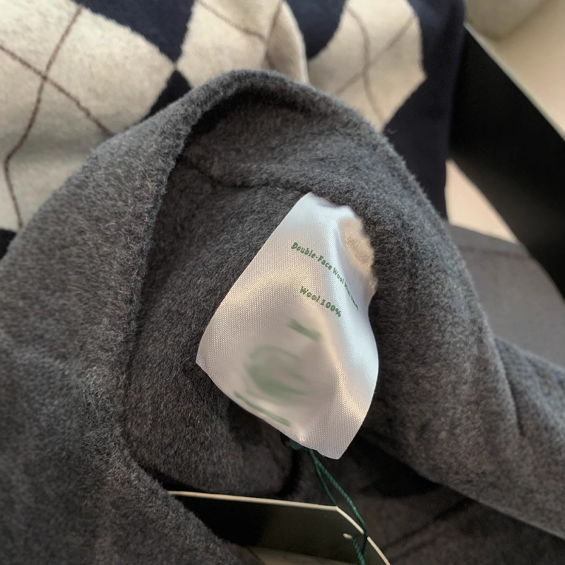 Fustă scurtă din lână, talie înaltă, croială A-line, uni, pliuri realizate manual și modelare, 90-95% lână, iarnă 2024