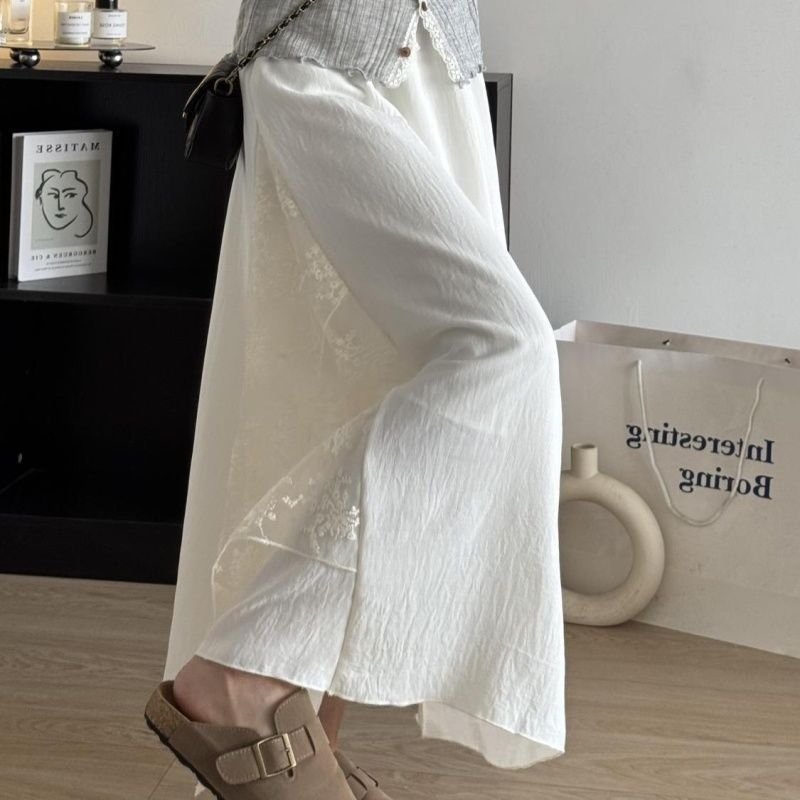 Patchwork midi suknja kremasto-bijela, A-linija, asimetrični rub, svestrana za svakodnevno nošenje