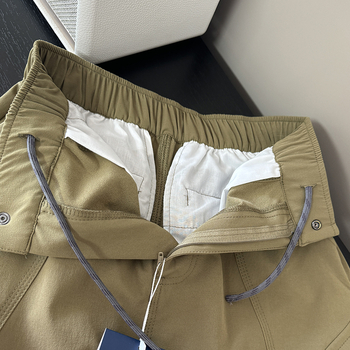 Szoknya: magas derekú, fűző, vízlepergető Chenille anyag, ferde zsebek