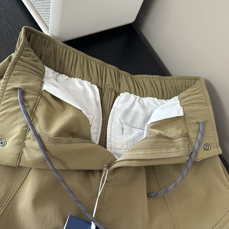 Szoknya: magas derekú, fűző, vízlepergető Chenille anyag, ferde zsebek