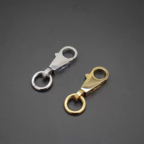 Ατσάλινος καραμπίνερ αποσκευών με γεωμετρικό σχέδιο, επένδυση από δέρμα κορυφαίας ποιότητας βοδινού, μάρκα Yiyu, Άνοιξη 2024