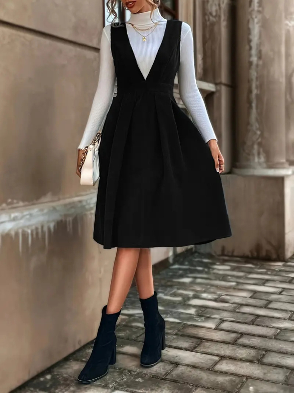 Poliészter anyagú közép hosszúságú ruha, magas derékkal és V-nyakú kivágással
