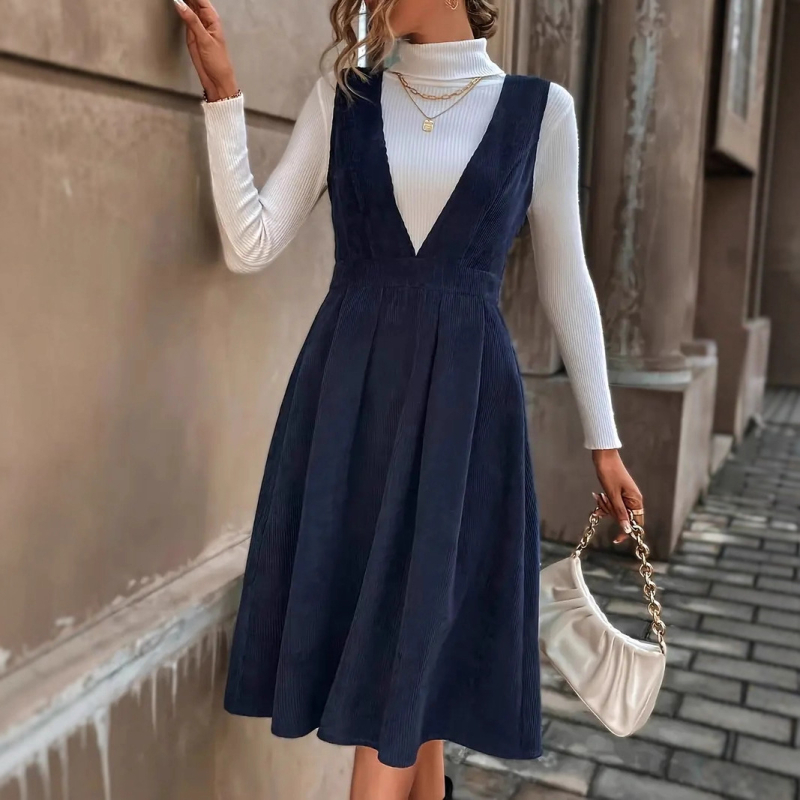 Poliészter anyagú közép hosszúságú ruha, magas derékkal és V-nyakú kivágással