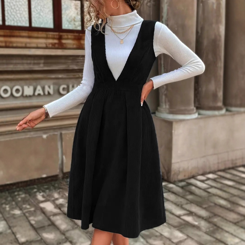 Poliészter anyagú közép hosszúságú ruha, magas derékkal és V-nyakú kivágással