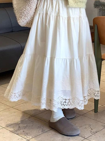 Fustă jacquard brodată, plisată, talie înaltă, croială de tip A – toamnă 2025