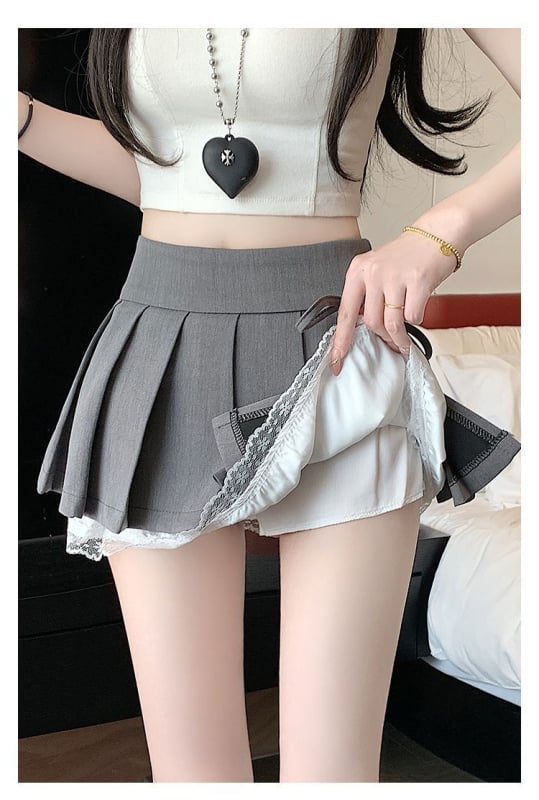 Плисирана мини пола от полиестер, съдържание на полиестер 30–50%, микроеластичност