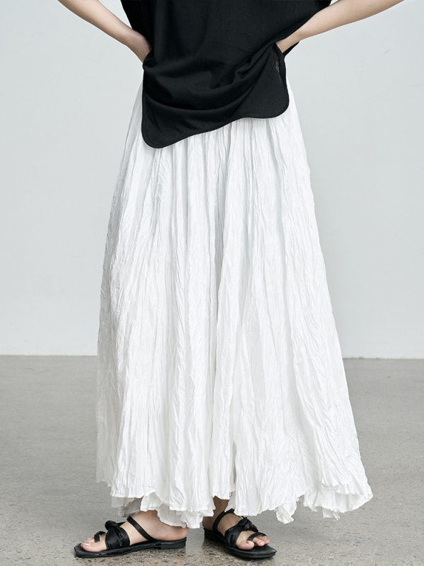 Пола с плисиран дизайн, висока талия, полиестер, пролет 2025 минималистичен стил.