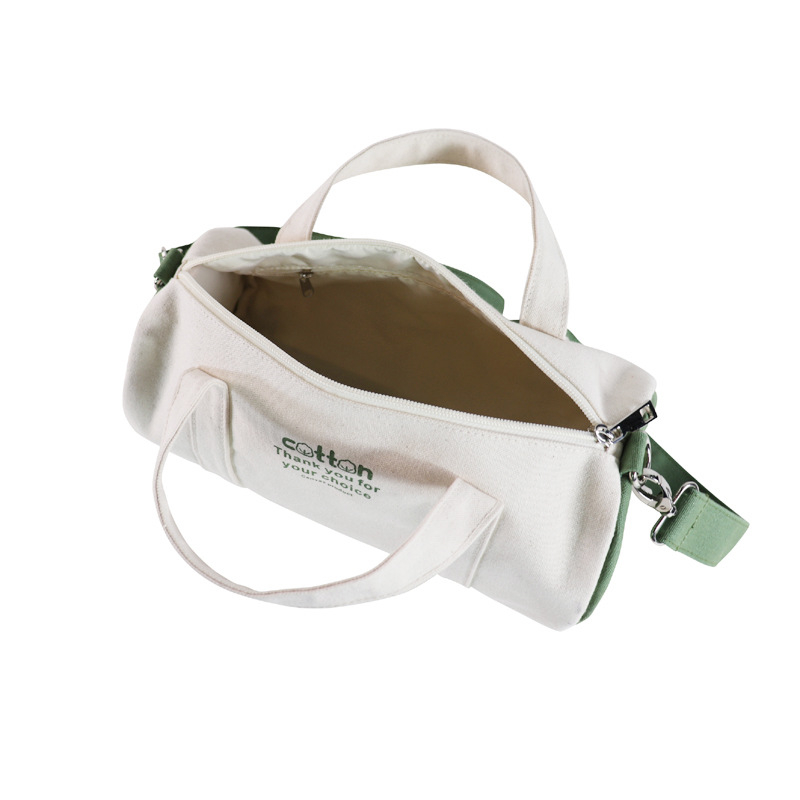 Mala crossbody torbica od platna, cilindričnog oblika bucket, zatvara zipom, jednobojna s prilagođenim logotipom